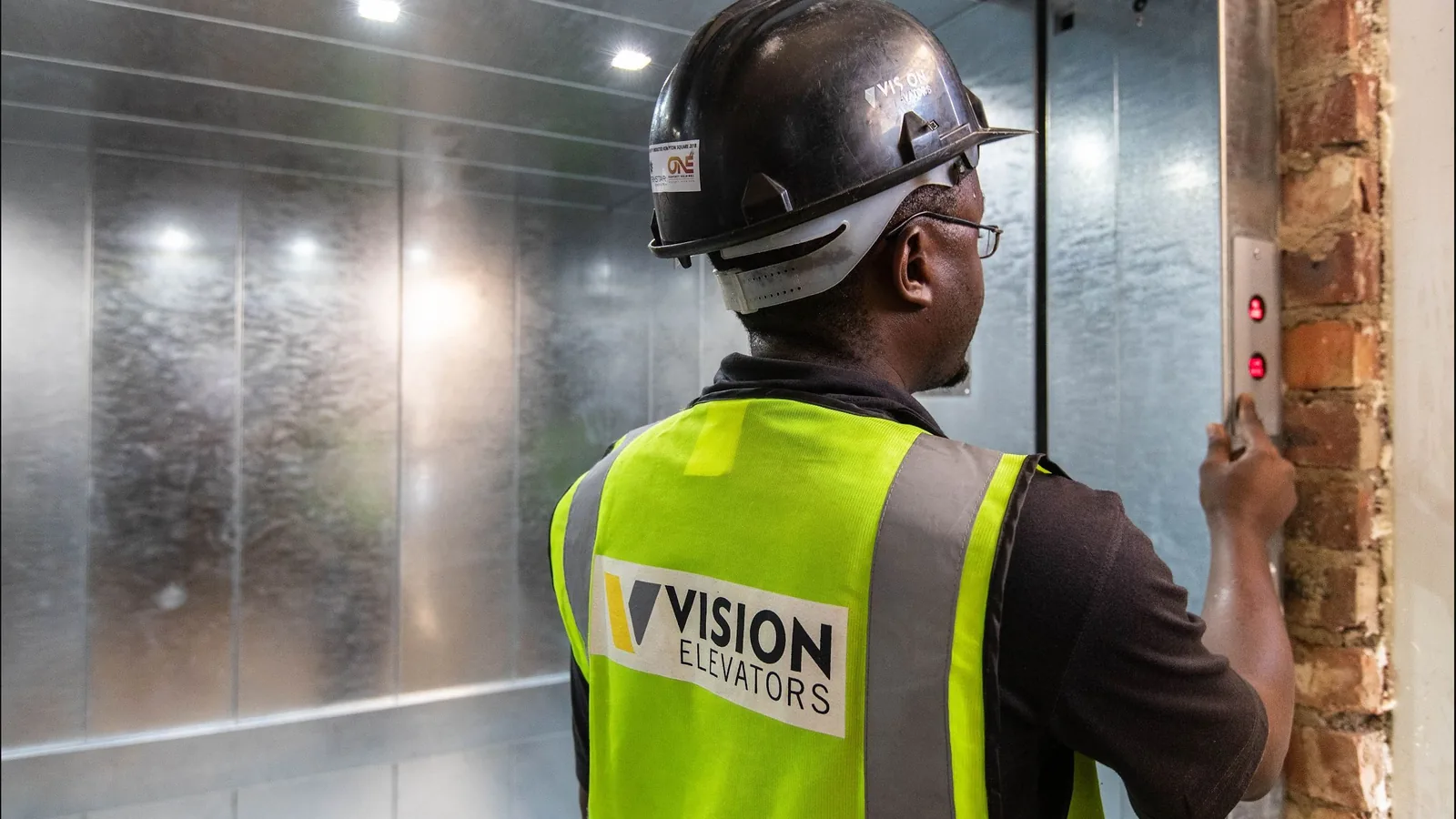 Vision Elevators technician working on goods hoist equipment