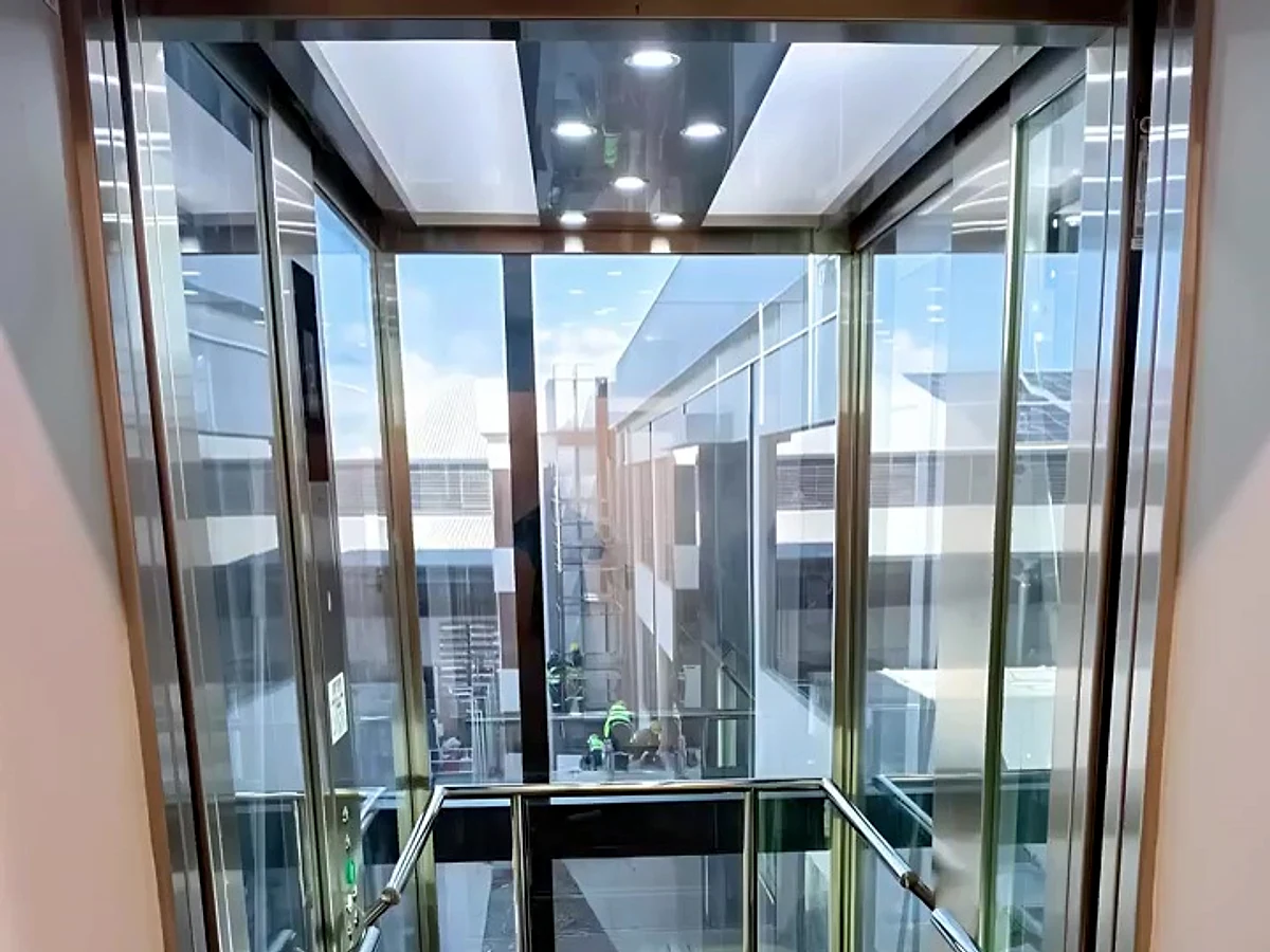 Interior view of a glass passenger elevator in KwaZulu-Natal
